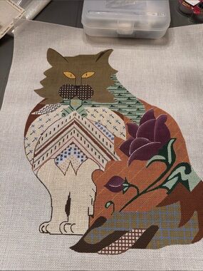 needlepoint canvas featuring a cat with patchworkand purple flowers, 🐈‍⬛